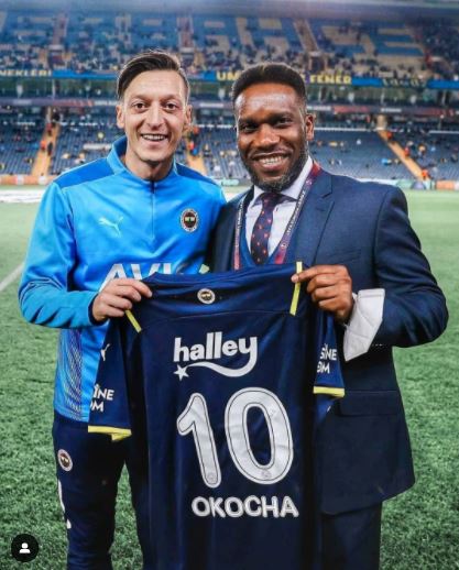 Ozil presents Okocha with favourite no 10 shirt - Daily Post Nigeria